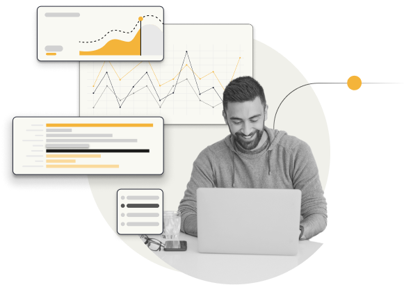 happy man using computer with charts in background